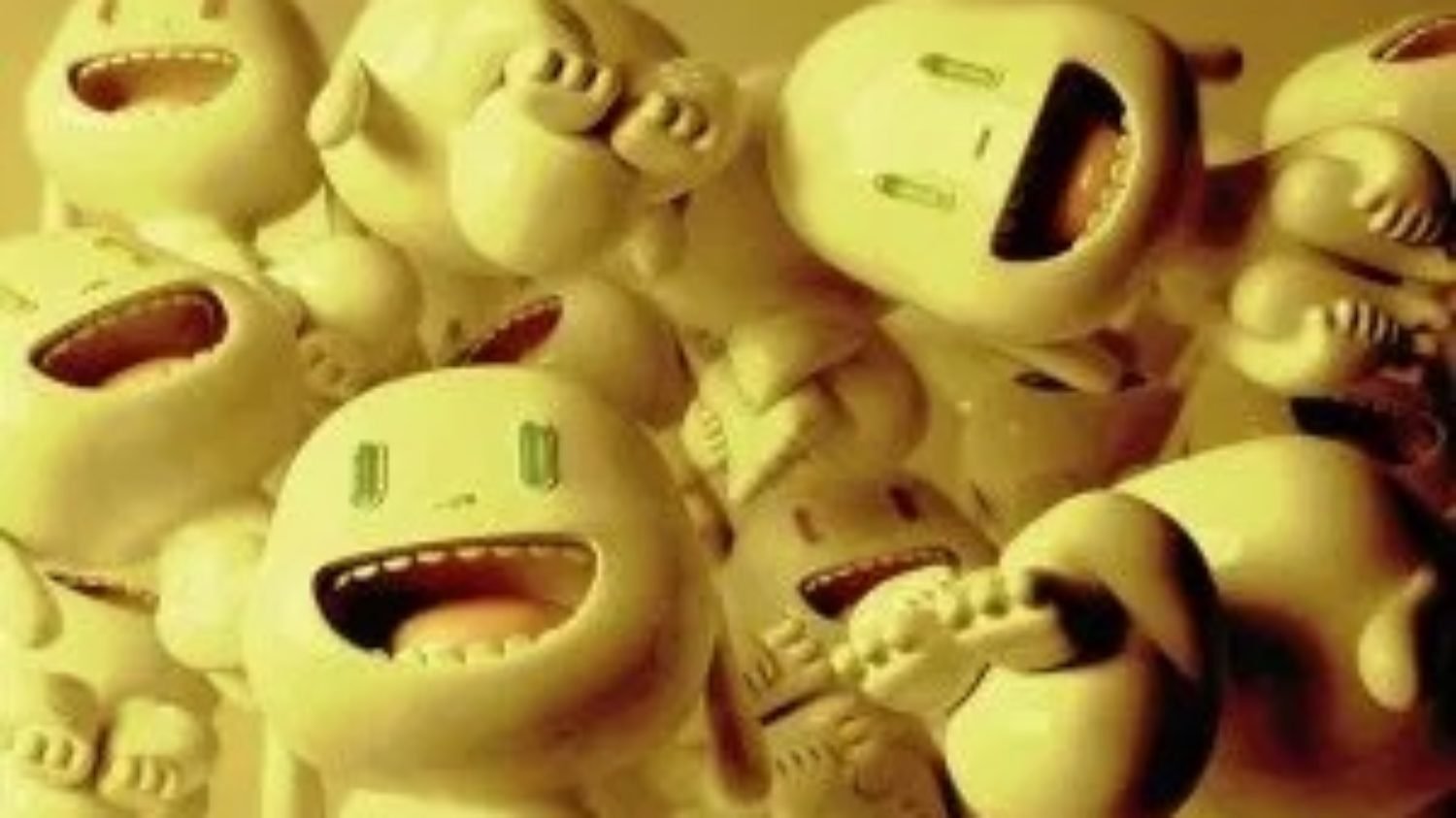 A heap of yellow, green-eyed crazy toothy grinned hysterical baby bots.