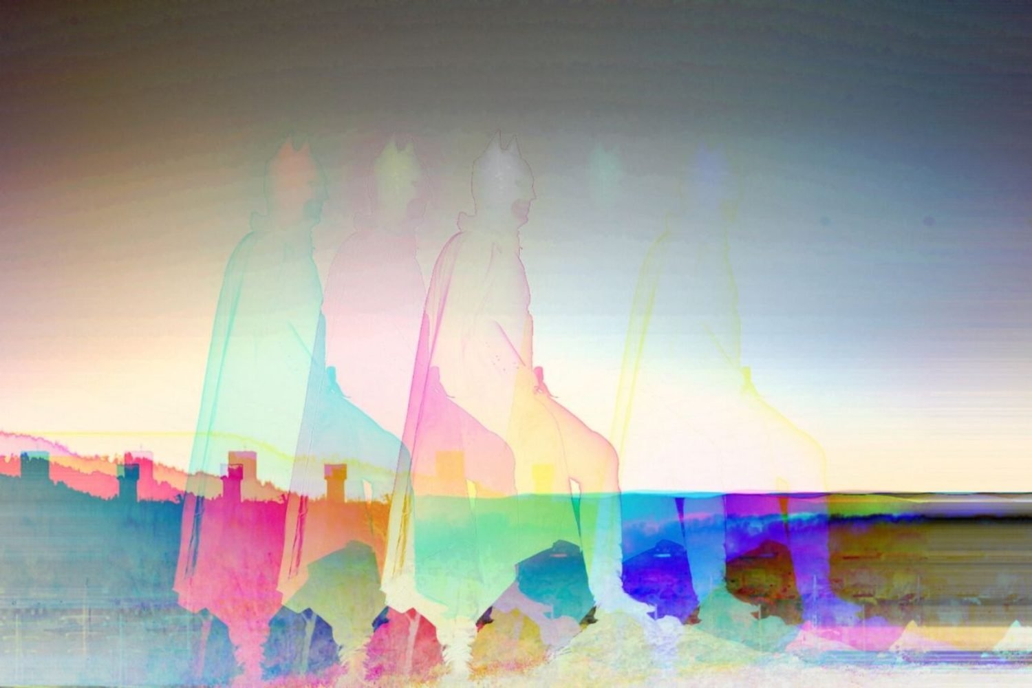 A rainbow-colored Batman outline in front of an ancient city background.